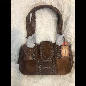 Trinity ranch brown cow hide purse